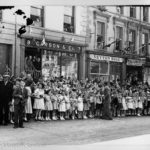 3 and 5 Market Street can be seen in the background of this image taken on the occasion of Queen Elizabeth (the Queen Mother) and Princess Margaret’s visit to Lurgan in June 1951. At this time Campbell and McGibbon (auctioneers) occupied number 3, William Seyton (butcher) occupied number 5, while Malcomsons funeral business was operating from the rear and yard of number 5. Image courtesy of Craigavon Museum Services.